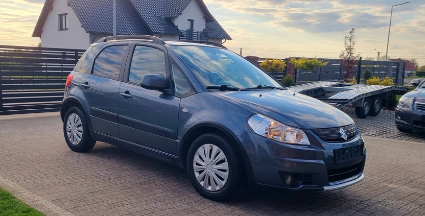 Suzuki SX4 cena 24900 przebieg: 152000, rok produkcji 2009 z Tuchola małe 407